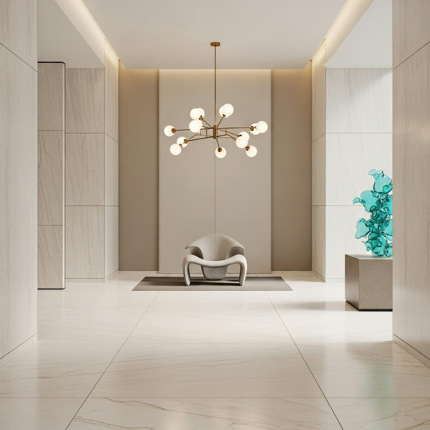 Showroom with marble floors, a sculptural chair and a gold chandelier